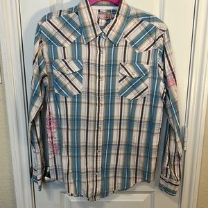 Pearl snap country shirt. Blue plaid with pink embroidered detail& rhinestones.